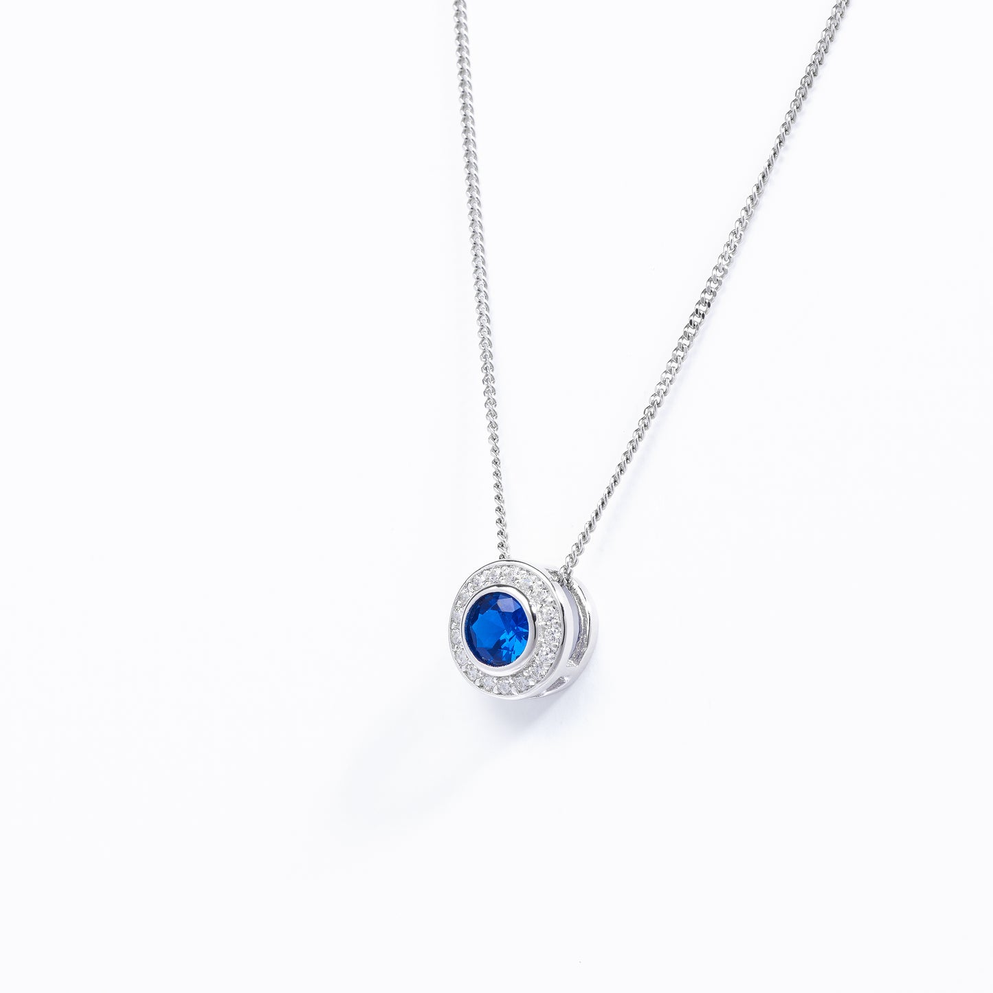 Sterling Silver Bezel Dark Blue Zirconia Halo Slider Pendant