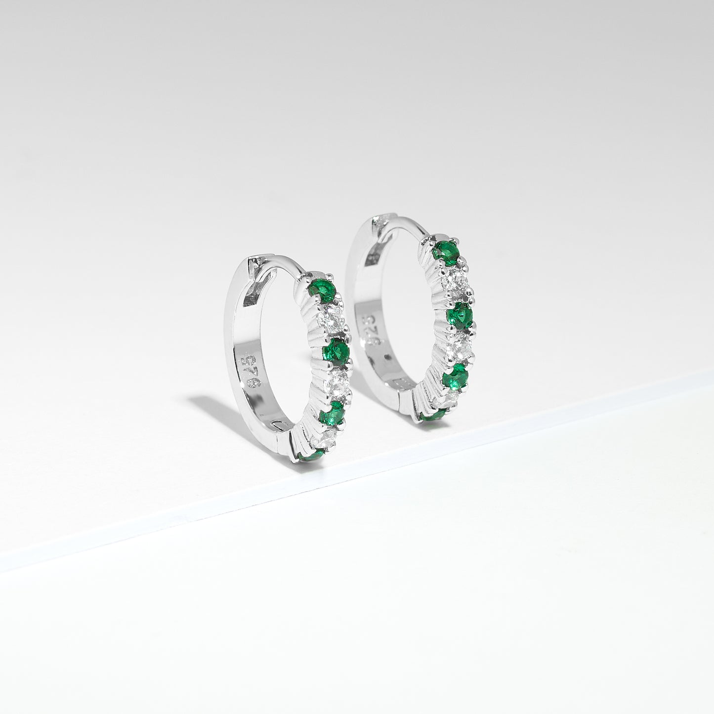 Sterling Silver Green And White Zirconia Huggie Earrings