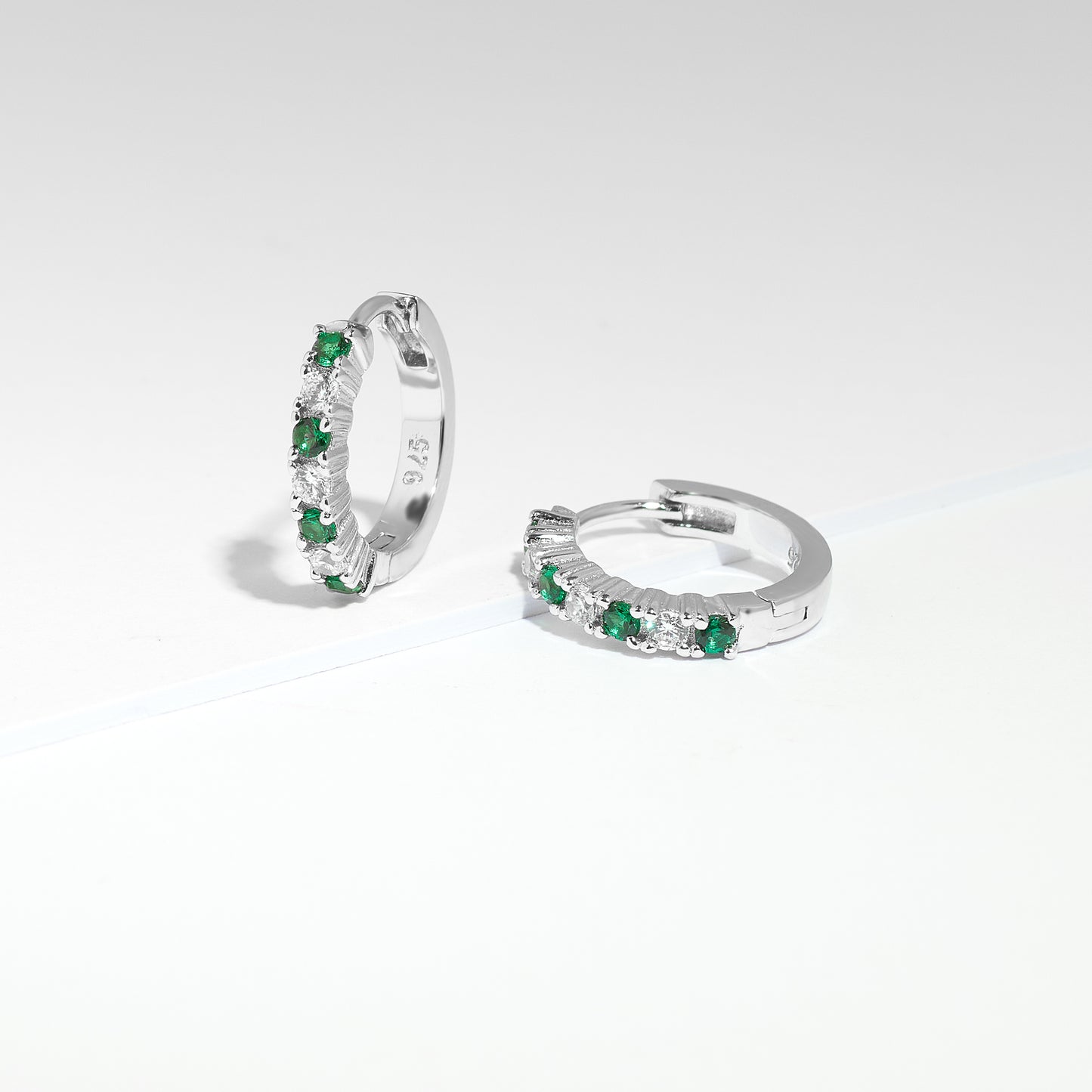 Sterling Silver Green And White Zirconia Huggie Earrings