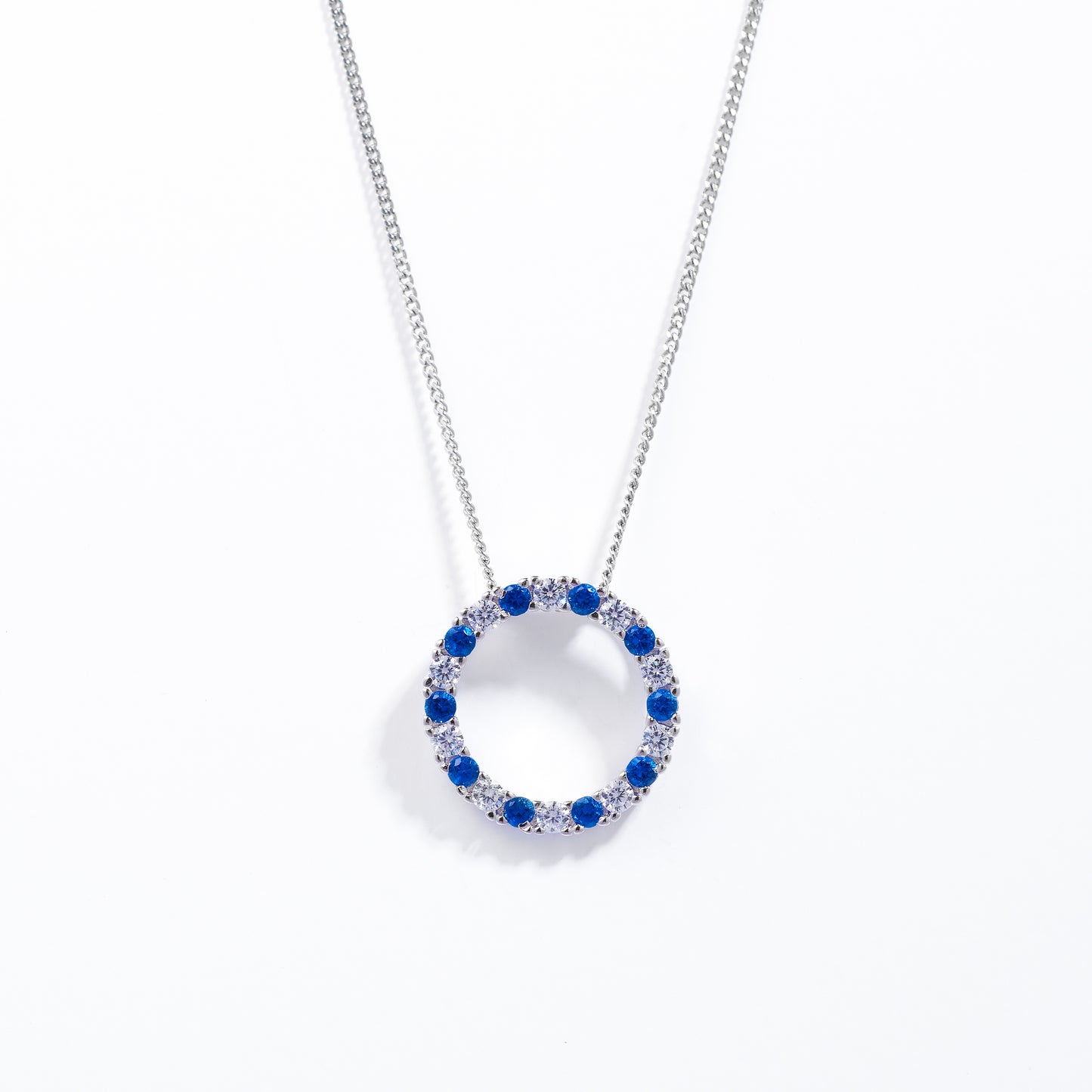 Sterling Silver Blue And White Zirconia Circle Pendant