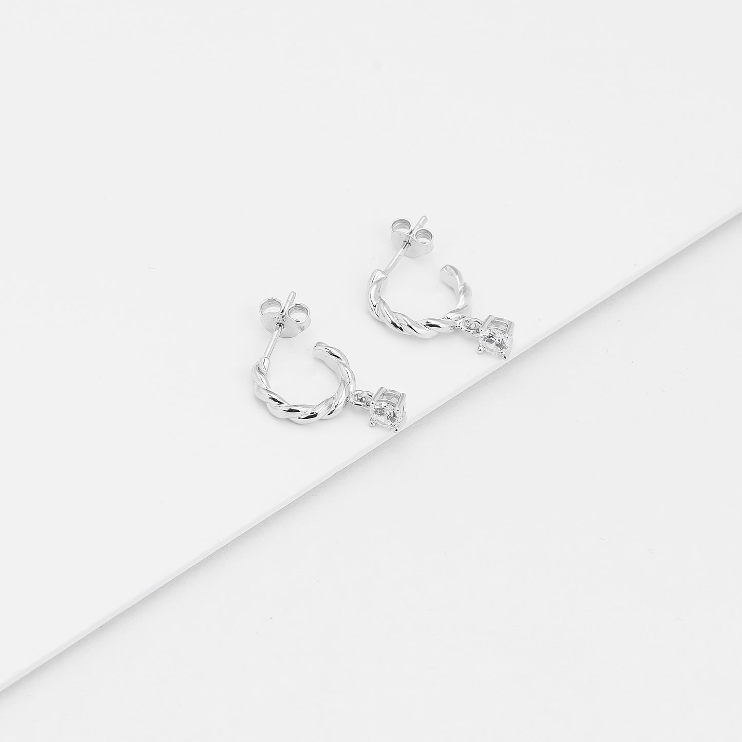 Sterling Silver Twist Hoop Earrings With Zirconia Drop