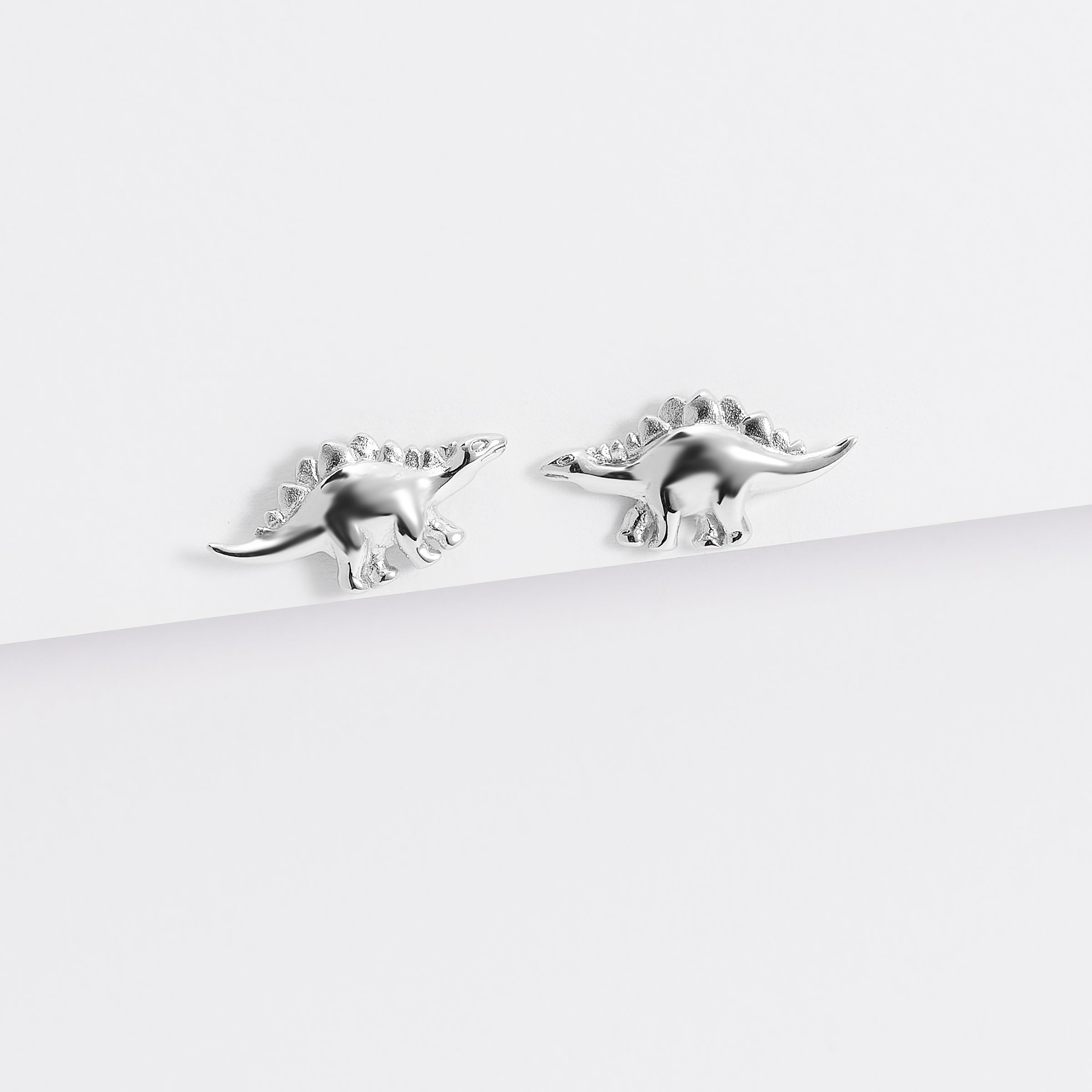 Silver dinosaur store earrings