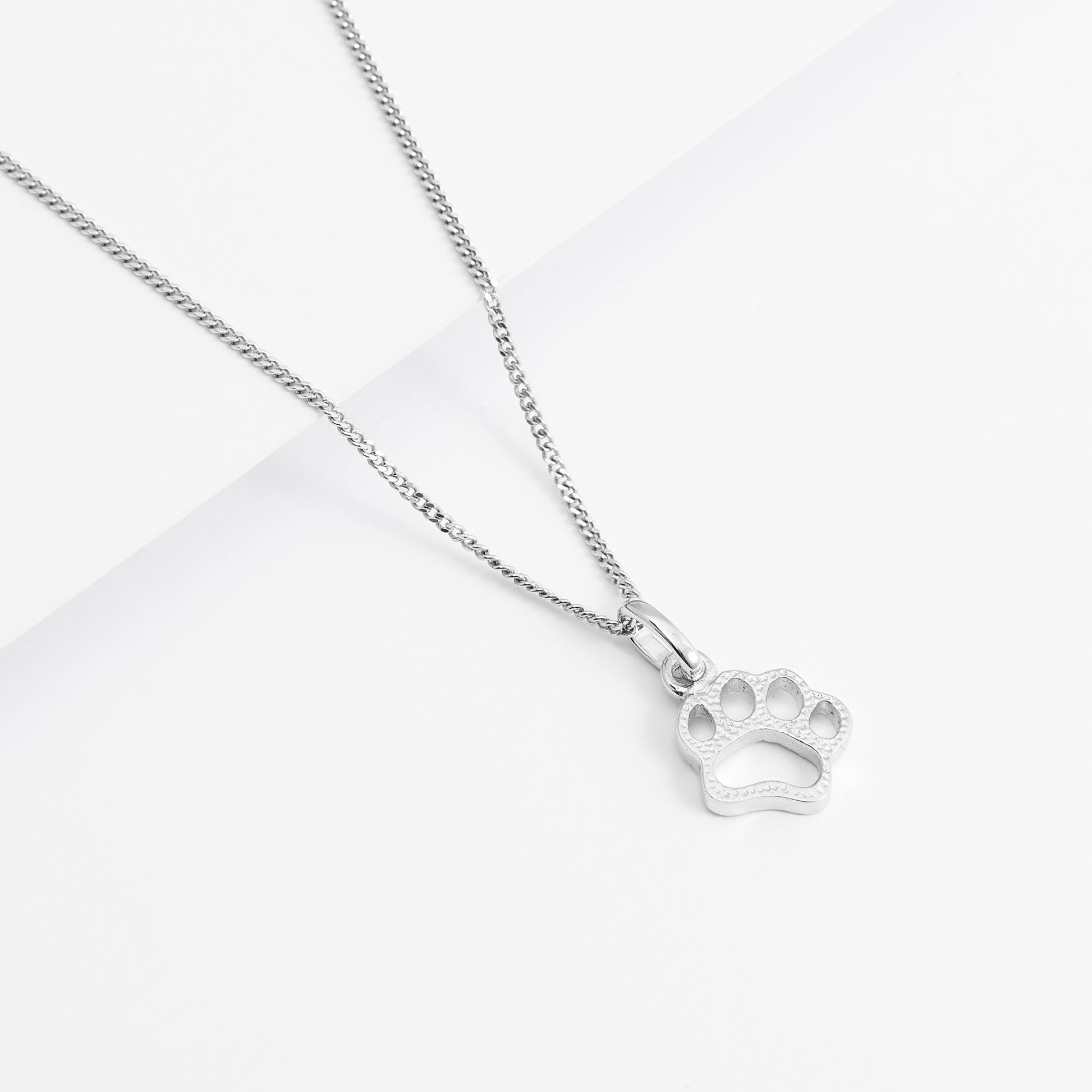 Sterling Silver Paw Print Pendant – Simon Curwood Jewellers