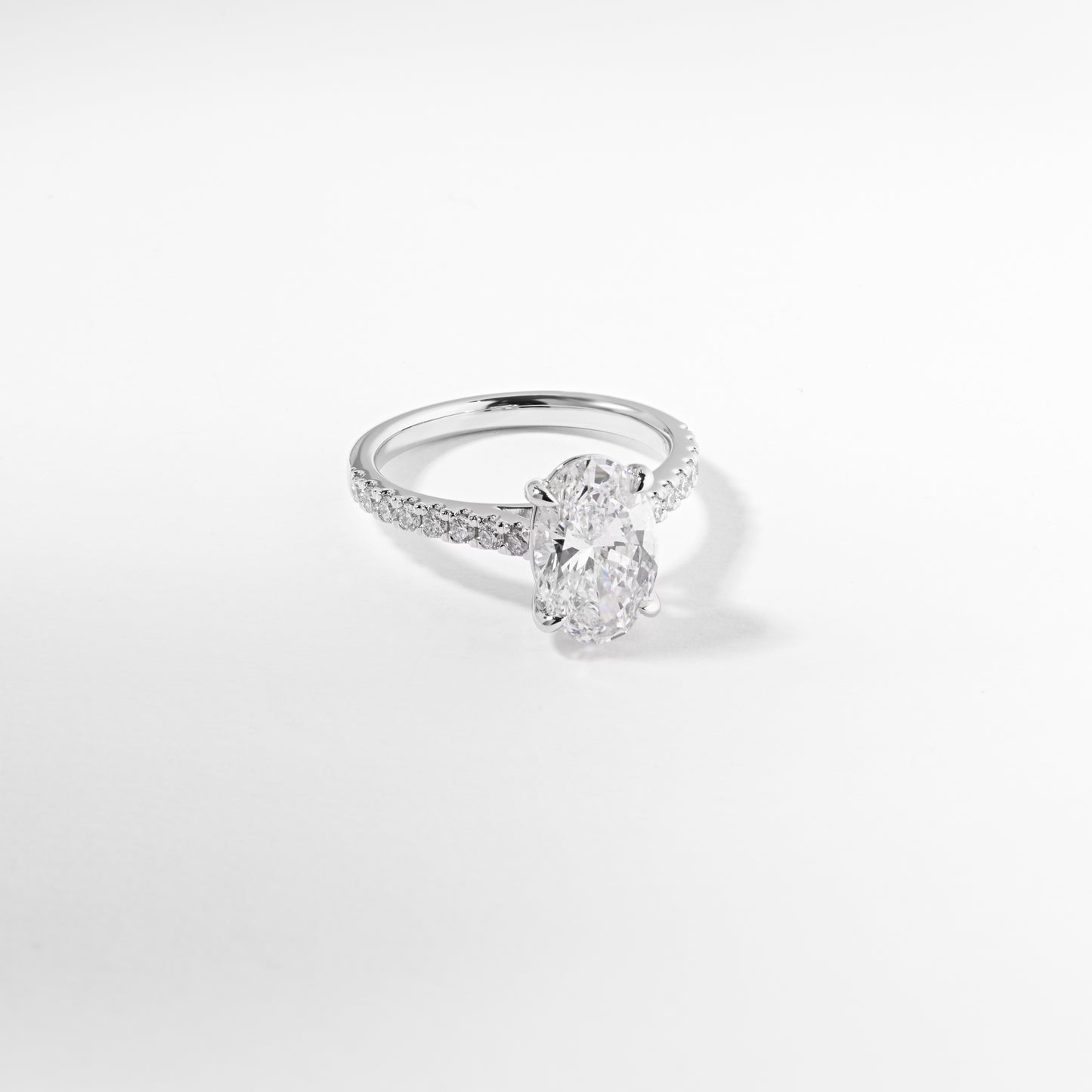 Platinum 2.5ct oval lab diamond FVS1 solitaire + shoulders custom-made engagement ring