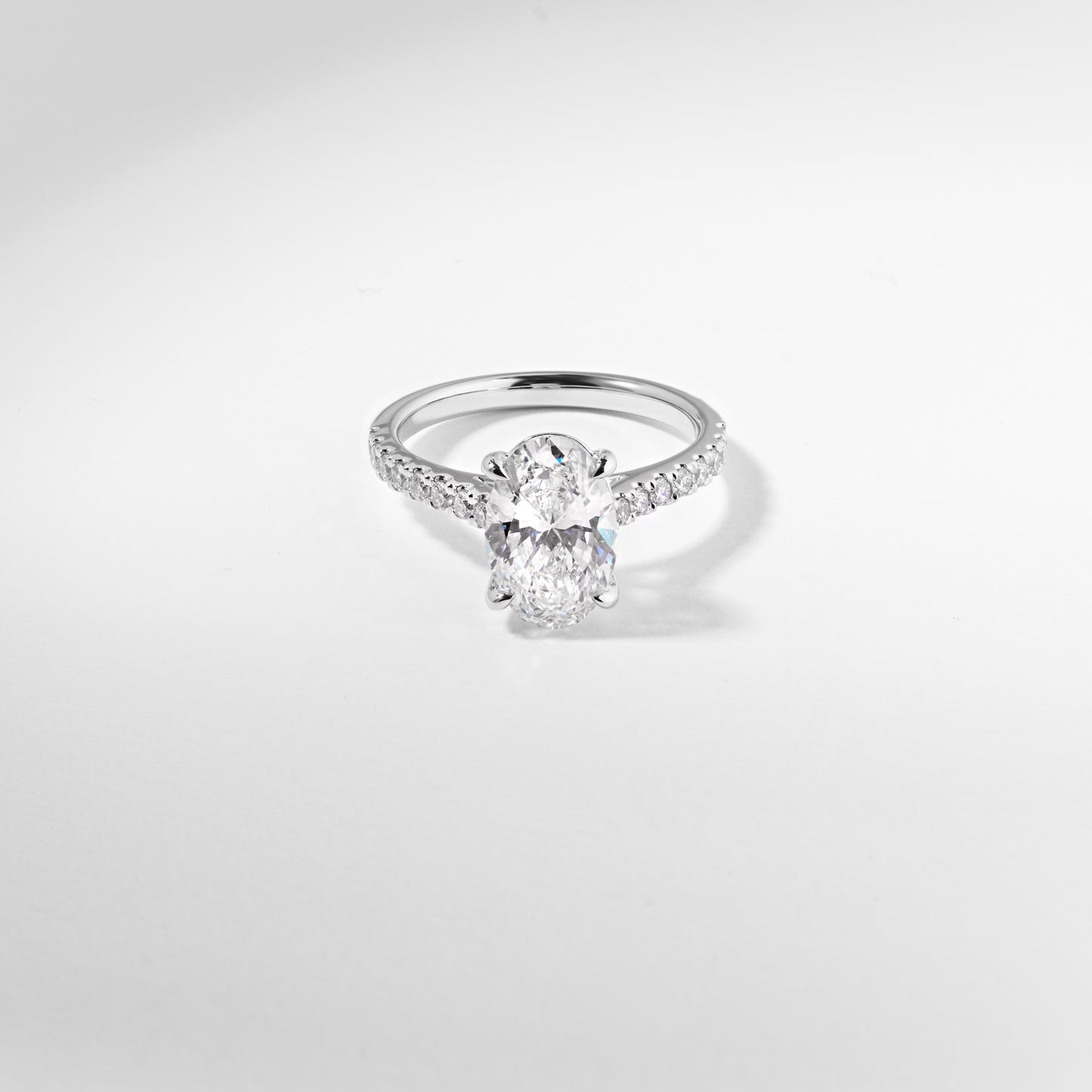 Platinum 2.5ct oval lab diamond FVS1 solitaire + shoulders custom-made engagement ring