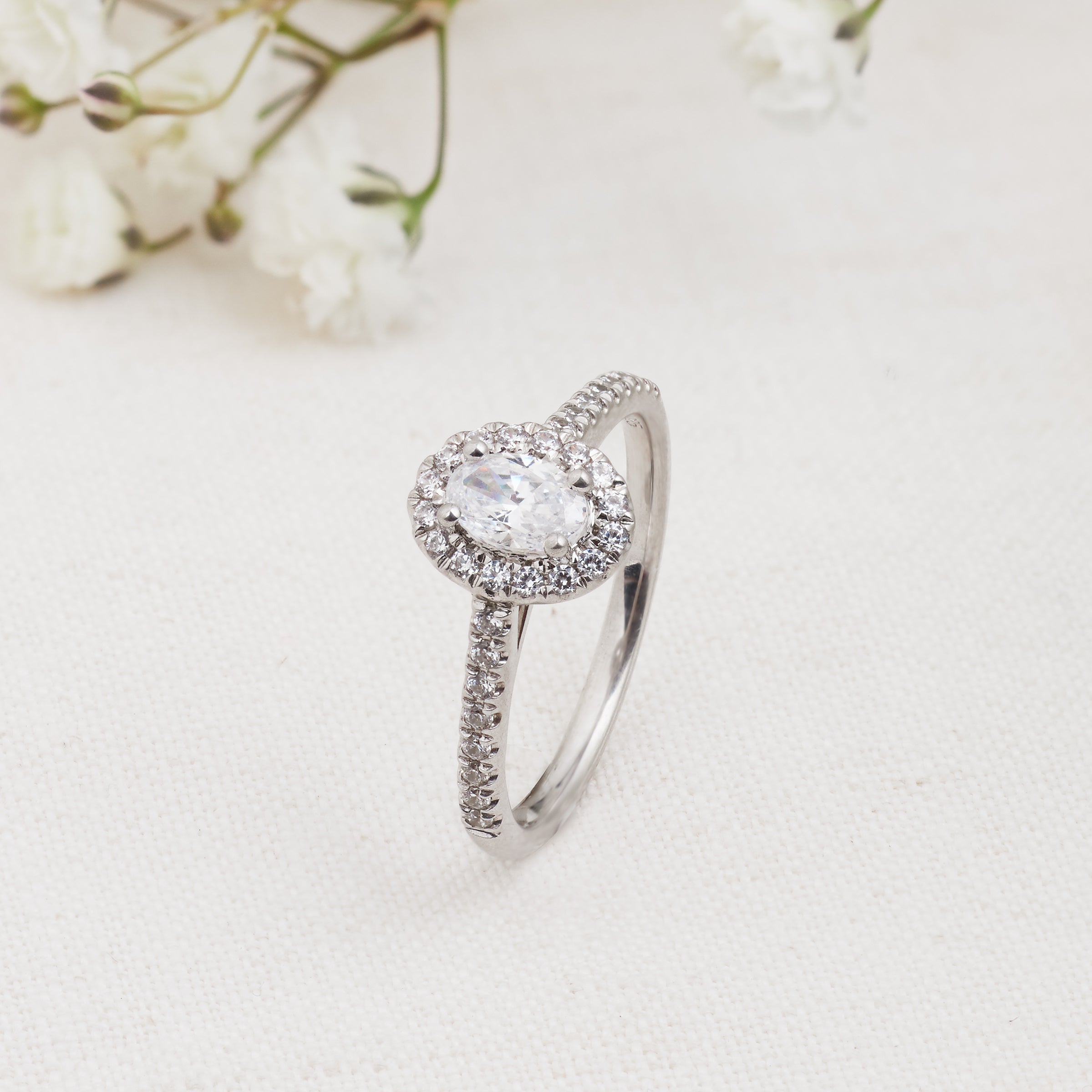 Halo hot sale moissanite ring