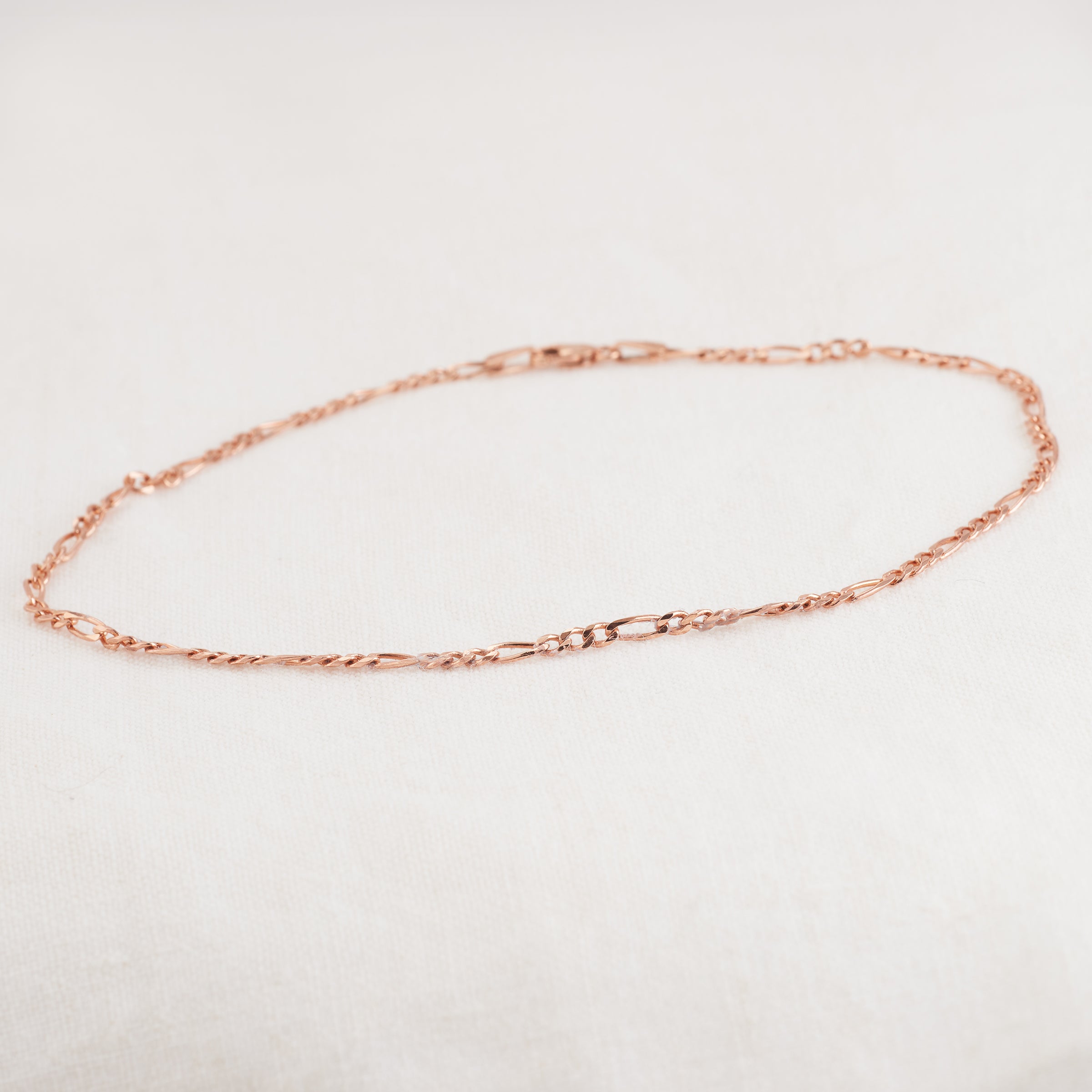 Gold figaro online anklet bracelet