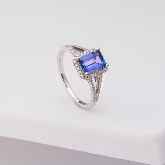 18K White Gold 8mm x 6mm Emerald Cut Tanzanite Diamond Halo Ring.